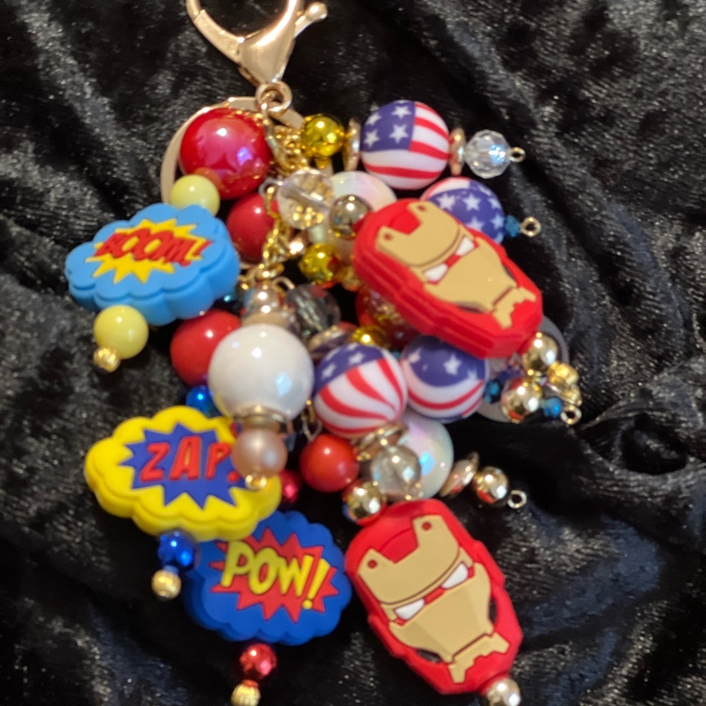 Superhero-Themed Keychain with Red and Yellow Accents